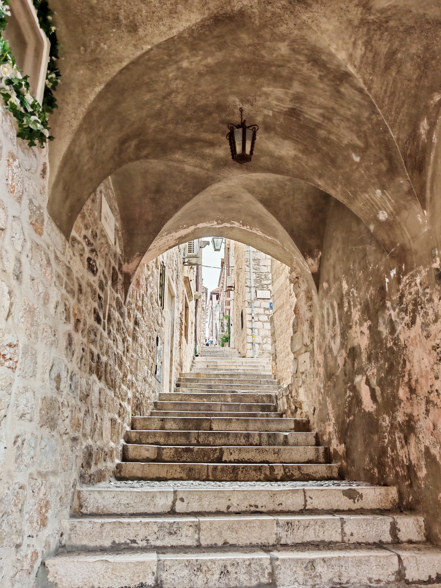 A quiet vaulted passage at day's end